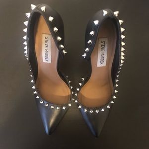 Steven Madden black heels with spikes.